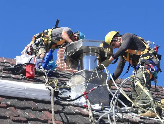 Protective chimney cap installed by Southbury Chimney Sweep in Southbury, CT